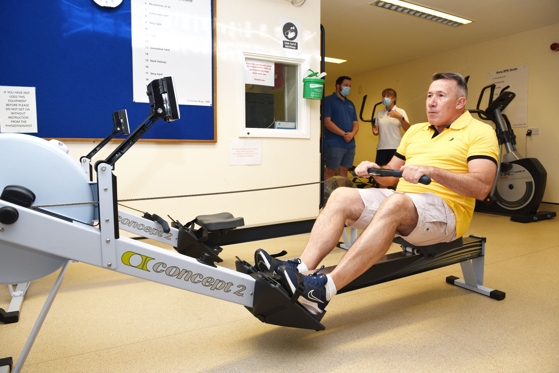 Man using rowing machine
